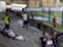 Surveillance camera mounted in football stadium from Axis Communications